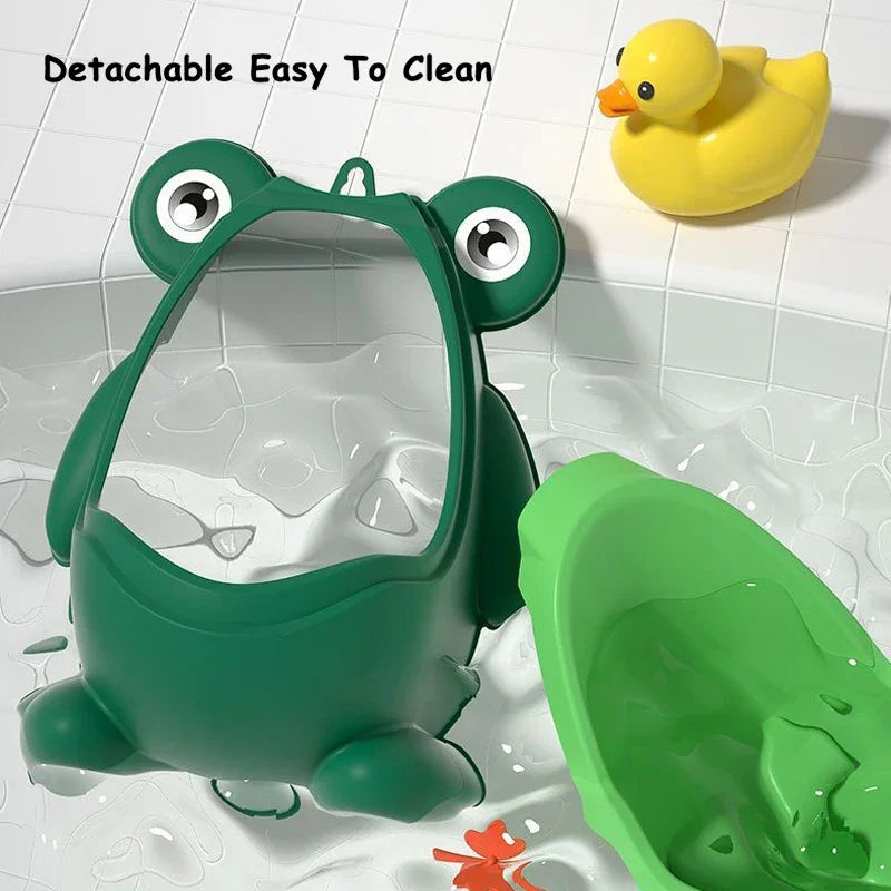 https://ae01.alicdn.com/kf/S67352d6e60be4ea6a610434c8d98e6aba/Children-Stand-Vertical-Cute-Frog-Potties-Training-Urinal-Boy-With-Fun-Aiming-Target-Toilet-Urinal-Trainer.jpg
